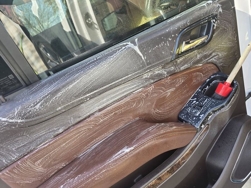 Leather door panel cleaned and conditioned
