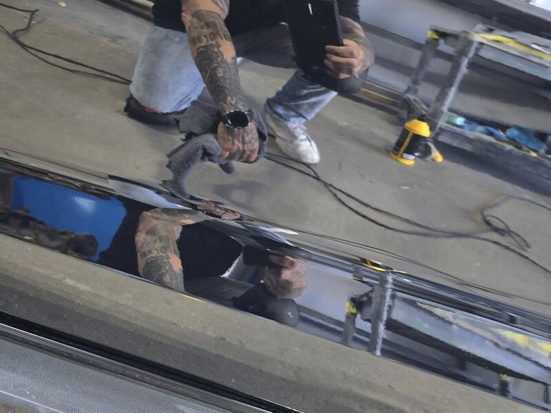 Machine polishing a boat hull
